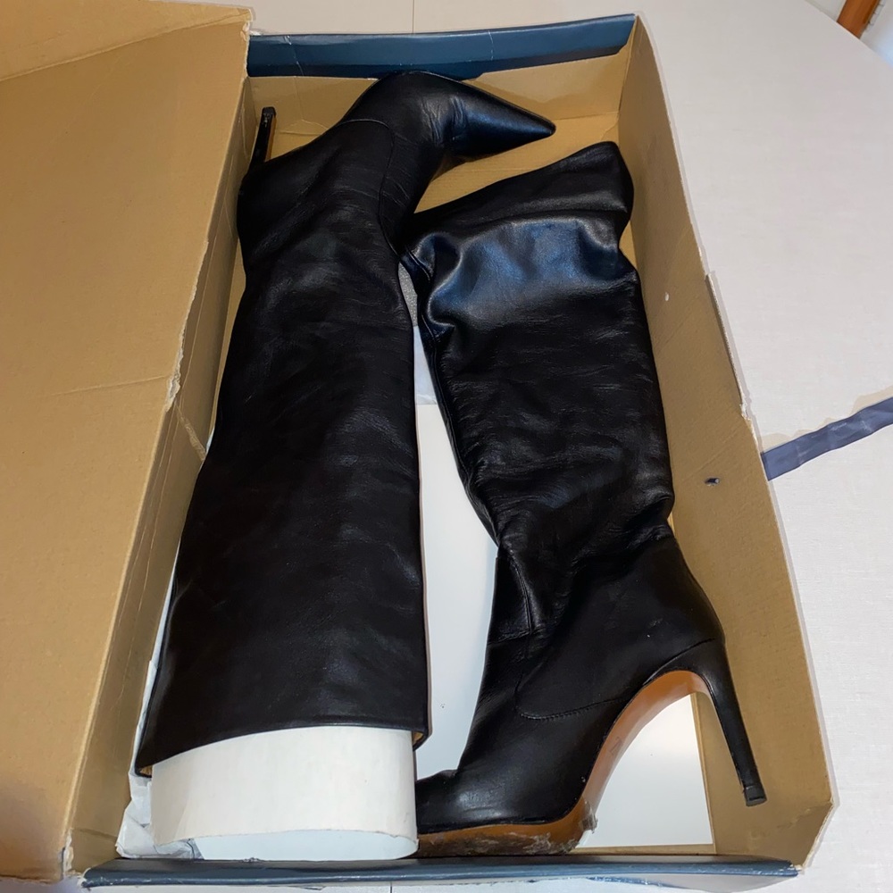 ZARA, tall leather high heeled boots in black.